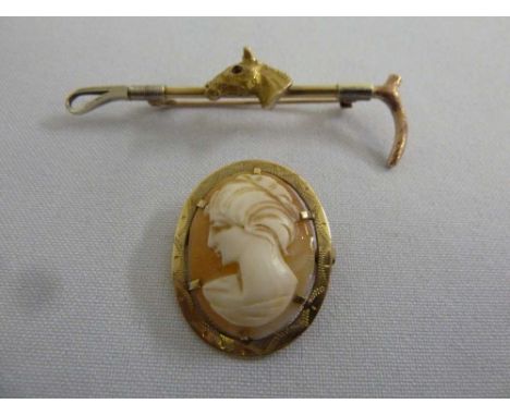 9ct gold horse and crop stick pin brooch and a 9ct gold cameo brooch