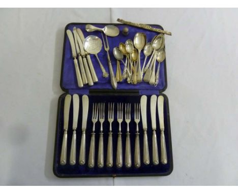 A quantity of silver flatware and a cased set of silver handled dessert eaters