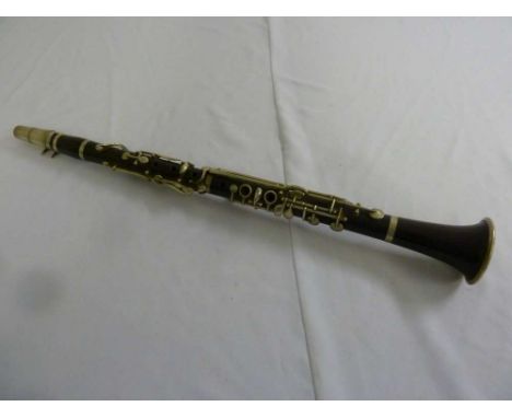 A 1920's Besson rosewood clarinet