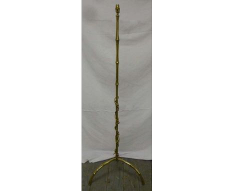 Brass lamp stand on three outswept legs of simulated bamboo form