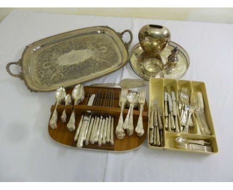 A quantity of silver plate to include a tea tray and flatware