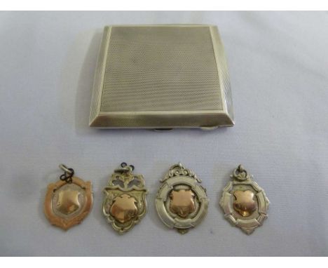 Silver engine turned cigarette case and four silver and gold medals