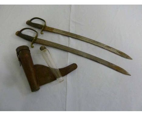 Two late 19th century cutlasses with shagreen handles and brass guards and a military glass hip flask in leather pouch