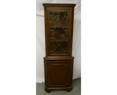 Mahogany glazed corner cabinet on bracket feet