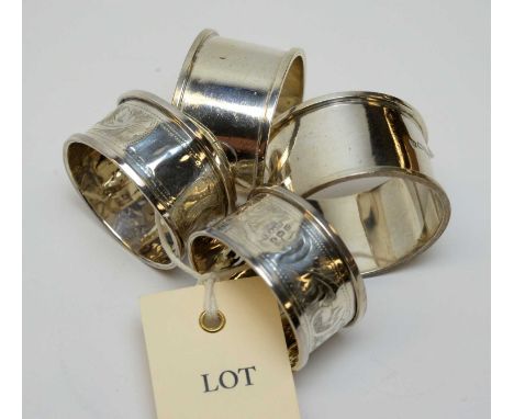 Two pairs of silver napkin rings, by Haseler and Bill, Chester, 1920, and F H Adams &amp; Co, Birmingham, 1902, 2.7ozs.