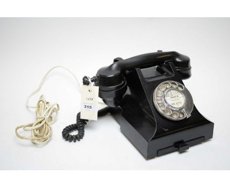 Vintage black bakelite telephone, handset stamped '164 46/1', 26cms wide. 