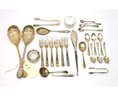 Silver and electroplate, including a silver-handled button hook, sugar tongs, a napkin ring, and sundry spoons, together with