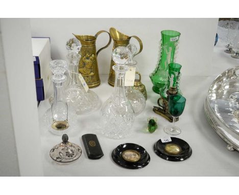 Four cut glass decanters and stoppers, the tallest 30cms high; two Mary Gregory style green glass vases; green glass bird pap