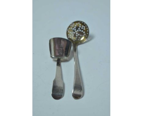 A George III silver caddy spoon of shovel form, by Samuel Pemberton, Birmingham, date indistinct, possibly 1781, together wit