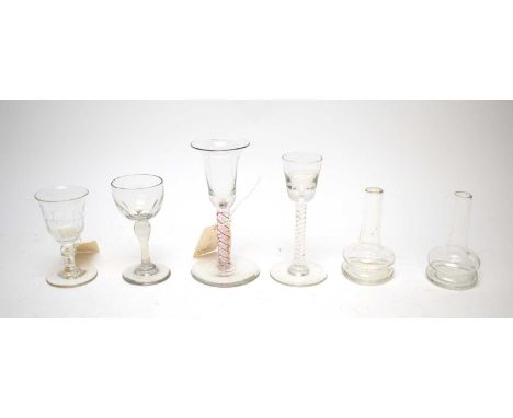 19th Century Dutch glass with red twist stem, 15.5cms high; along with a 19th Century Dutch gin glass inscribed 'Hulstkamp's 