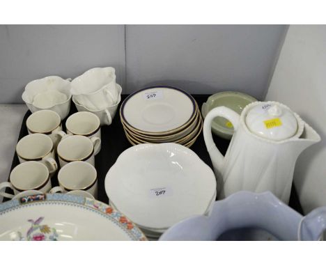 A Shelley part coffee service in white, comprising coffee pot, three cups, five saucers, two side plates, and a small sugar b