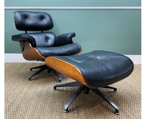 MODERN PLYWOOD '670' LOUNGE CHAIR & '671' STOOL AFTER A DESIGN BY CHARLES & RAY EAMES, with black cushions (2)Comments: headr