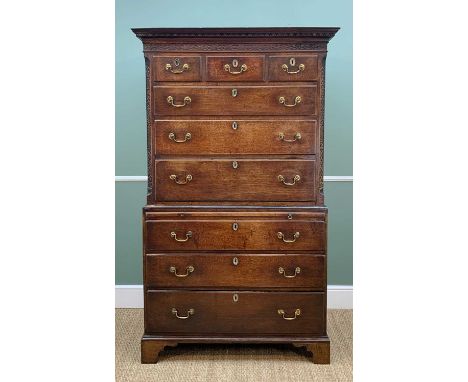 GEORGE III OAK TALLBOY CHEST, dental cornice and blind fret, carved frieze above three short, three graduated long drawers on