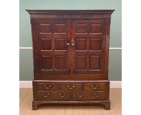 LATE 18TH CENTURY WELSH OAK PRESS CUPBOARD, probably Cardiganshire, cavetto cornice and blind fret frieze above fielded panel