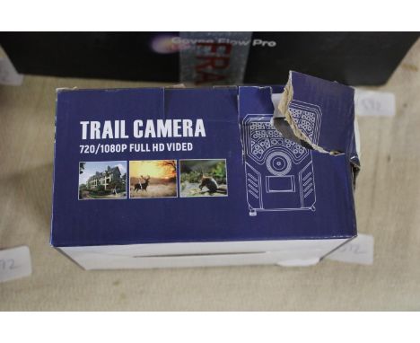A boxed digital trail camera (untested) 
