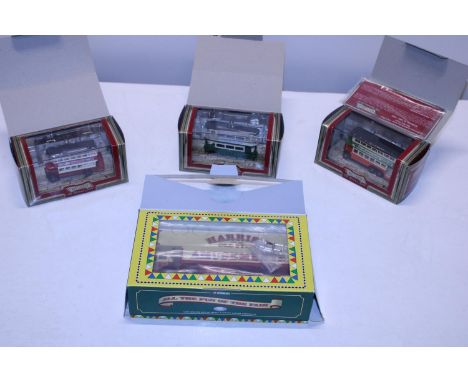 A box Corgi Fairground model and three Days Gone boxed bus models 