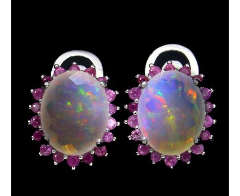 A pair of 925 silver oval cut opal and ruby set cluster earrings, L. 1.5cm.