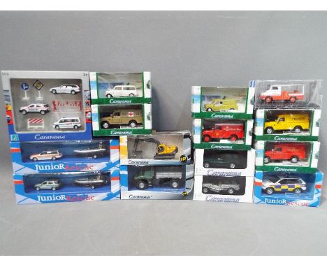 A collection of boxed diecast model vehicles in various scales to include Cararama and Oxford Diecast, models appear M in ori