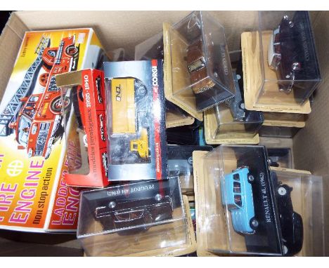 A good mixed lot of approximately 25 boxed model motor vehicles to include Corgi, Solido, a large scale Ladder Fire Engine an