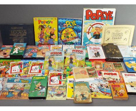 Popeye - A mixed lot of collectable items relating to Popeye to include video cassettes, books, activity books, mini comics, 