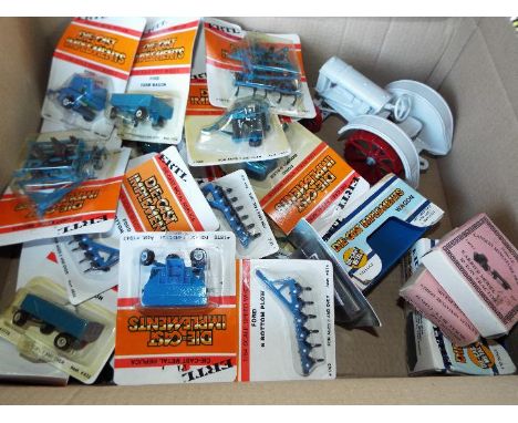 ERTL - approximately 27 diecast model 1:64 scale farm implements, wagons, bottom plows (ploughs), round balers, all appear mi