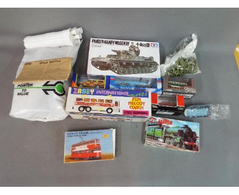 Tamiya, Airfix; Sun Ta Toys, Corgi - An assortment of 11 diecast and plastic model vehicles, model kits, and toy soldiers. lo