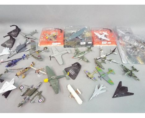 Dinky, Ertl and Similar - Five boxed / carded and approximately 20 unboxed diecast model aircraft in various scales. Lot incl