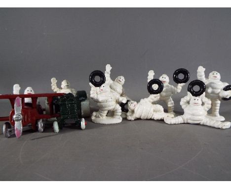 A set of cast iron Michelin with plane and tractor (xm15)