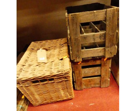 A Fortnum &amp; Mason branded wicker hamper, together with two 12 division beer crates (3)