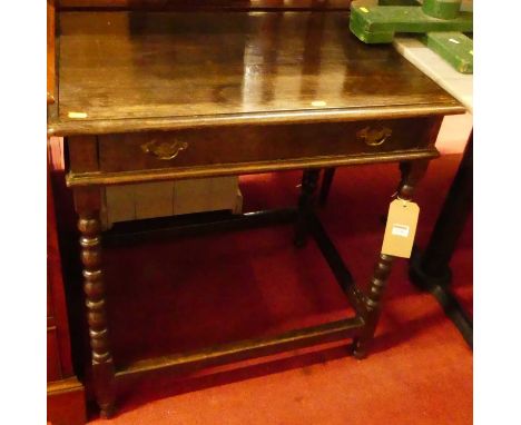 An antique joined oak bobbin turned single drawer side table, w.73cm 