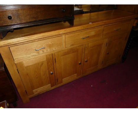 A contemporary light oak long sideboard, width 200cm