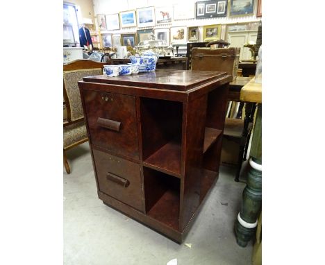 A vintage metal filing cabinet with two drawers and shelves