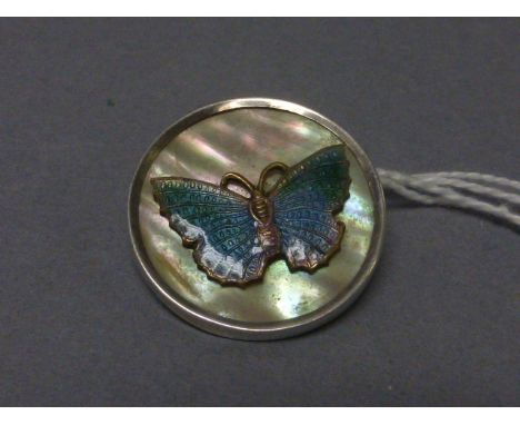 Vintage Silver Rimmed and Mother of Pearl Brooch set with an Enamel Butterfly