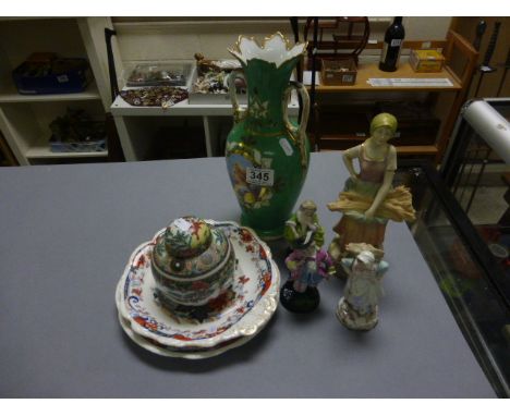 Four continentel ceramic figures one with blue sword mark to base,two 19th century ironstone plates, a two handled  vase with