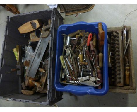A large quantity of tools contained within three boxes.