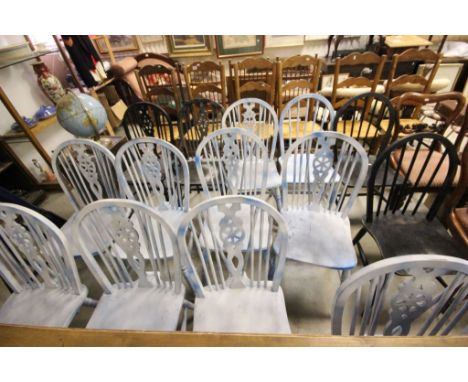 Eleven Wheelback Dining Chairs (some with a distressed blue finish) together with Three similar Hoop Stick Back Dining Chairs