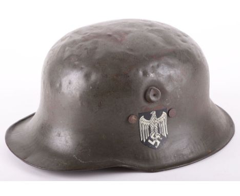 WW2 German Childs (Kinder) Helmet, good example of one of the helmets produced for wear by a child, helmet retains nearly all