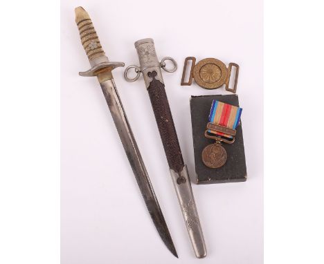 WW2 Japanese Dagger / Dirk, with sharkskin grip with wire binding, white metal mounts and housed in the original scabbard wit