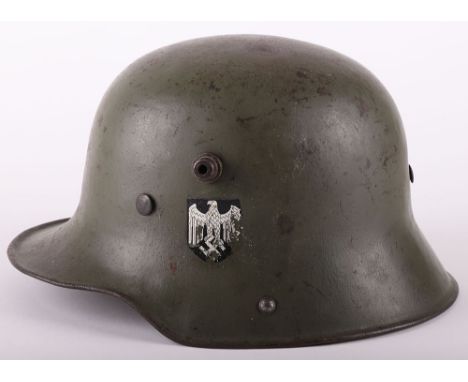 WW2 German M-16 Transitional Steel Combat Helmet, good example of an M-16 steel combat helmet which has the original field gr