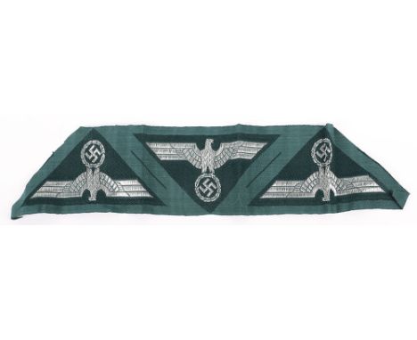 Mint Un-Issued Strip of German Army NCO’s M-44 Pattern Combat Tunic Eagles, fine un-issued strip of three breast eagles in tr