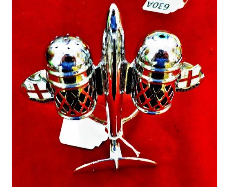 A 1960's Chromium plated and enamel decorated cruet in the form of a jet aeroplane. City of London Souvenir Modern Collectabl
