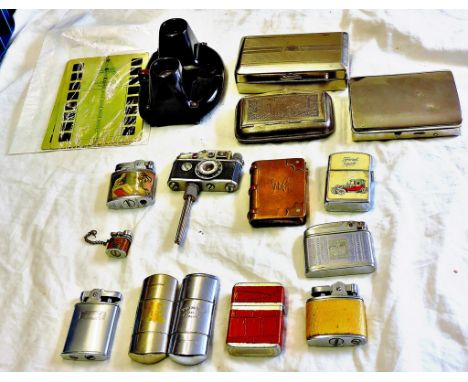Lighters - Petrol (11) Including Zippo, a camera and a brass trench art lighter. One slide viewer with three saucy cards of f