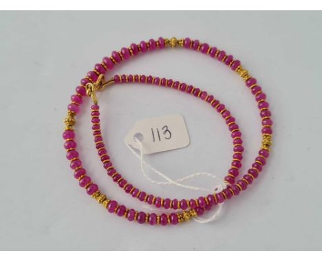 A ruby necklace with 18ct gold mounts 16 inch