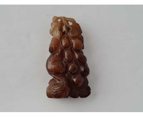 A Chinese carved squirrel brown jade pendant 6 cm long 33g