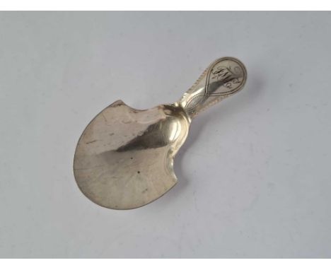 A George III bright cut caddy spoon with shovel bowl, Birmingham 1799 by IT