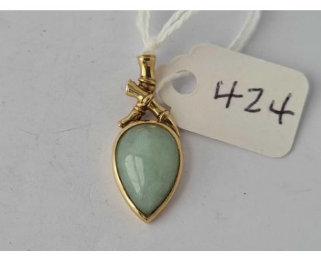 A gold &amp; jade drop pendant with bamboo detail to the top, marked 9ct