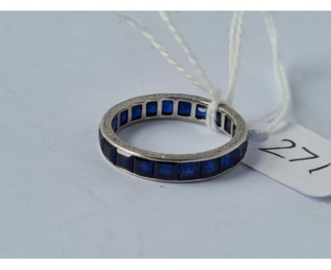 A full sapphire eternity ring in 18ct white gold size O ½  3.5g inc