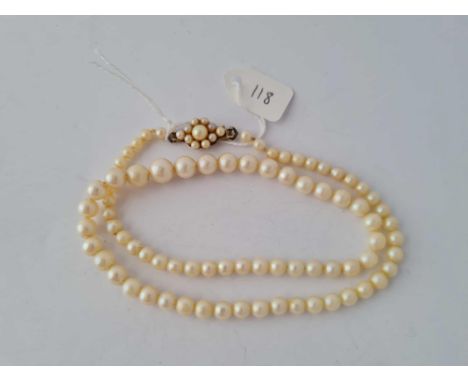 A cultured pearl necklace with 9ct clasp