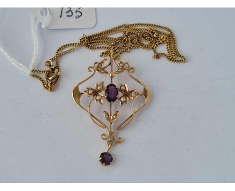 A Edwardian amethyst and pearl pendant on 9ct neck chain 18 inch