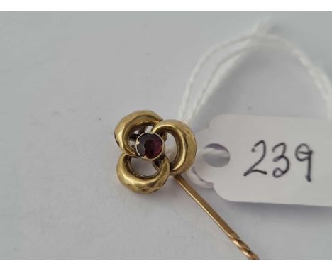 A fancy Almandine garnet vintage stick pin in high carat